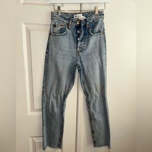Distressed hem blue denim straight leg jeans